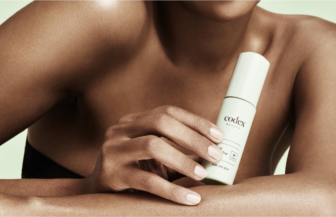 SAFETY IS A GIVEN. Woman with Codex Beauty product.
