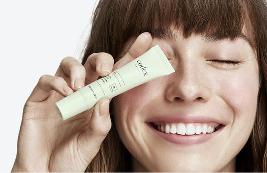 WHAT IS SKIN? Girl with Codex Beauty Skin care product.